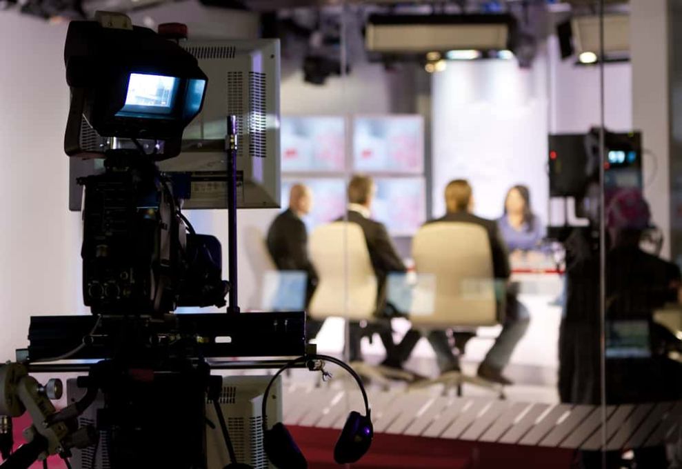 A TV news studio with camera equipment
