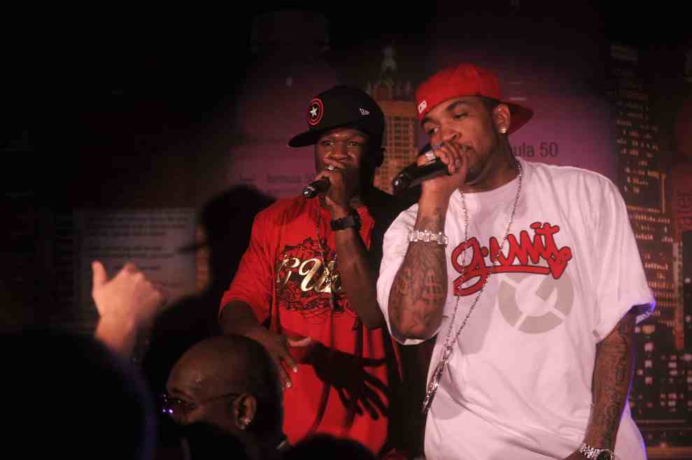 Musicians 50 Cent (L) and Lloyd Banks perform at Vitaminwater Celebrates in Style with The Best of Baseball and Music at Hudson Terrace on July 14, 2008 in New York City.