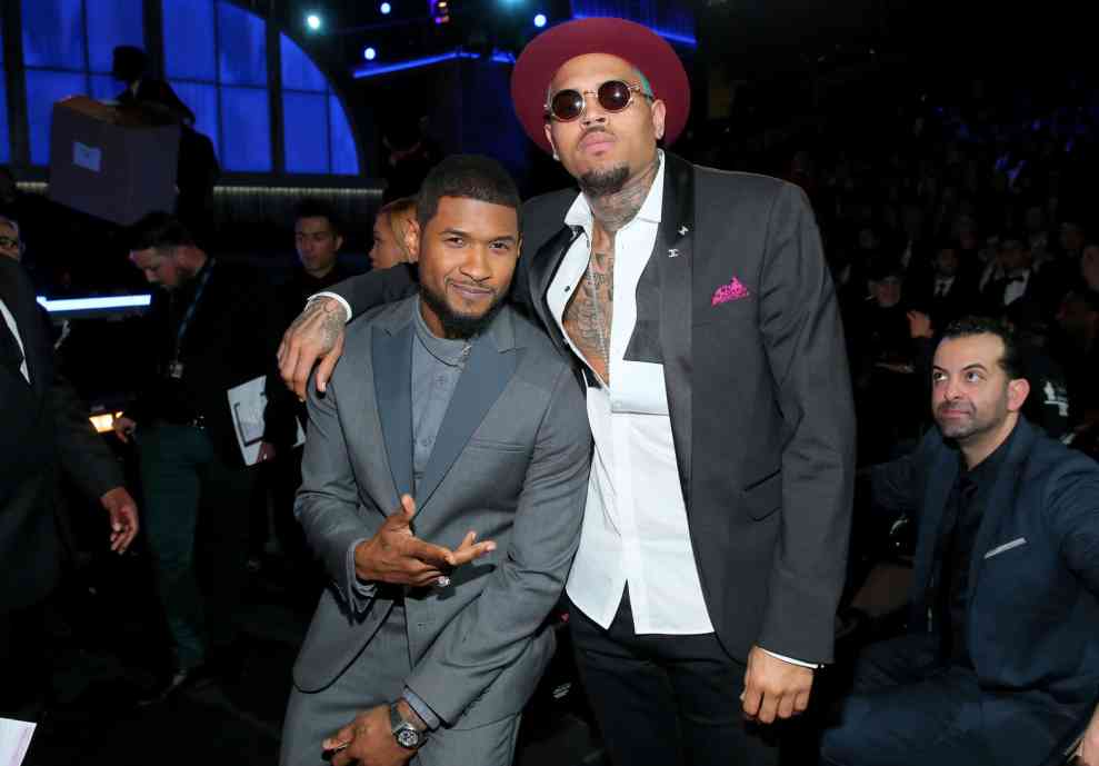 LOS ANGELES, CA - FEBRUARY 08: Recording artists Usher and Chris Brown attend The 57th Annual GRAMMY Awards at STAPLES Center on February 8, 2015 in Los Angeles, California.