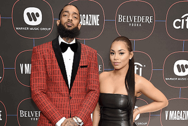 Nipsey Hussle and Lauren London arrive at the Warner Music Group Pre-Grammy Celebration at Nomad Hotel Los Angeles on February 7