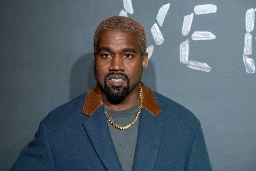 NEW YORK, NEW YORK - DECEMBER 02: Kanye West attends the the Versace fall 2019 fashion show at the American Stock Exchange Building in lower Manhattan on December 02, 2018 in New York City.