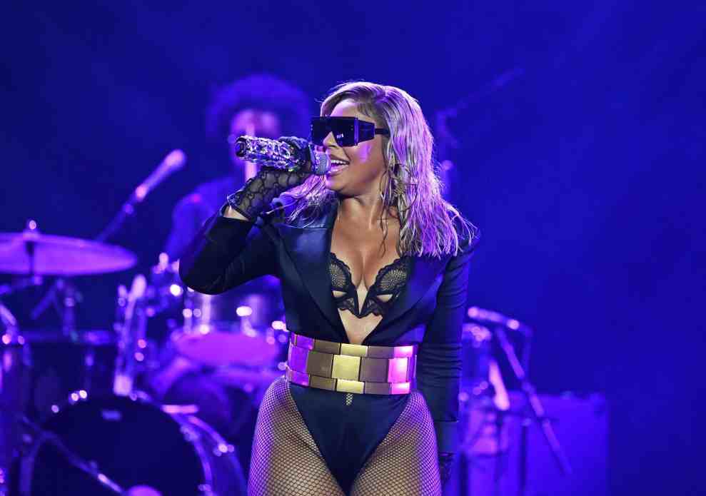 NEW ORLEANS, LOUISIANA - JULY 03: Ashanti performs onstage with The Roots during the 2022 Essence Festival of Culture at the Louisiana Superdome on July 3, 2022 in New Orleans, Louisiana.