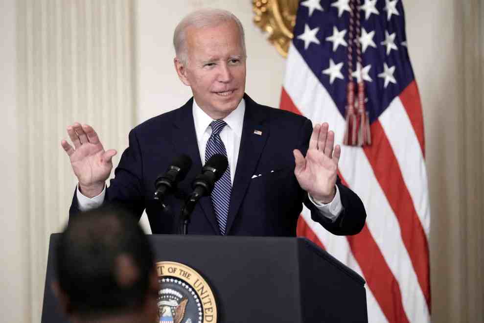 WASHINGTON, DC - AUGUST 16: U.S. President Joe Biden delivers remarks before signing The Inflation Reduction Act in the State Dining Room of the White House August 16, 2022 in Washington, DC. The $737 billion bill focuses on climate change, lower health care costs and creating clean energy jobs by enacting a 15% corporate minimum tax, a 1-percent fee on stock buybacks and enhancing IRS enforcement.