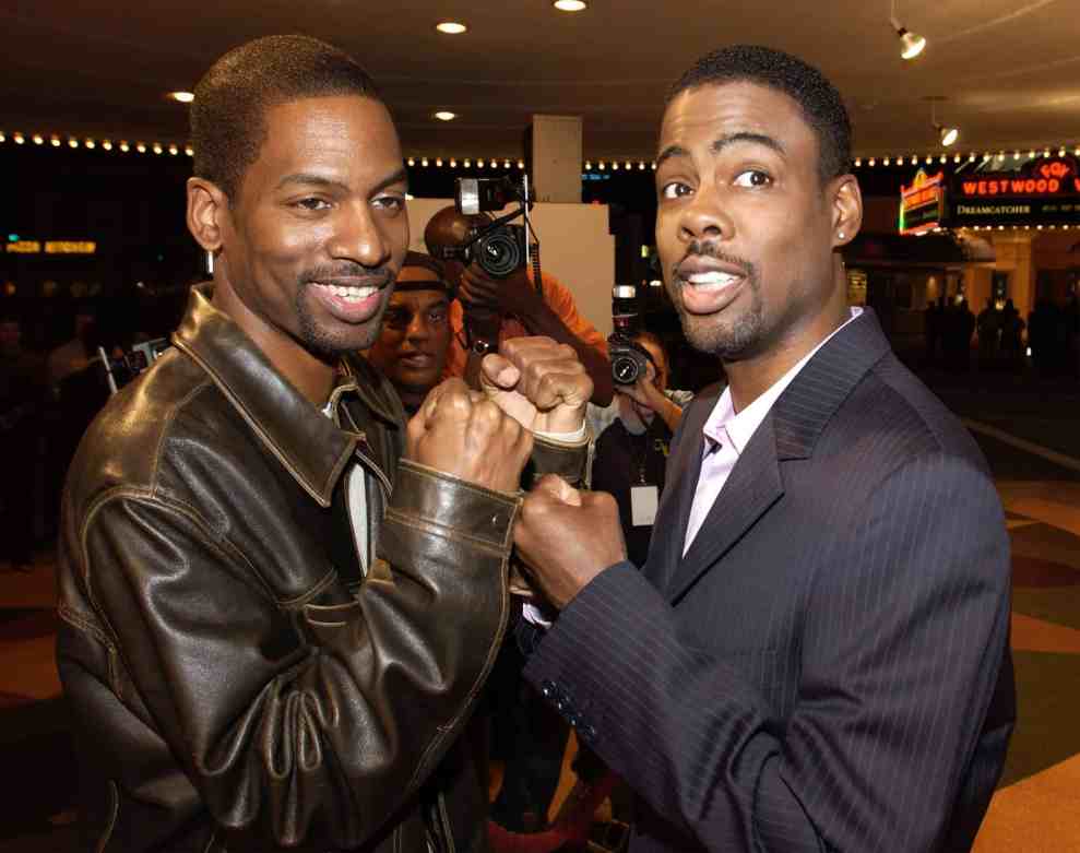 Actor/comedian Chris Rock (R) and his brother Tony attend the premiere of the DreamWorks film "Head of State" on March 26, 2003 in Westwood, California.