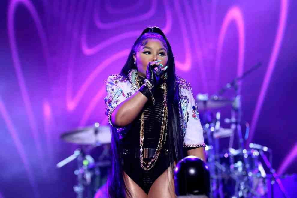 Lil' Kim performs onstage with The Roots during the 2022 Essence Festival of Culture at the Louisiana Superdome on July 3, 2022 in New Orleans, Louisiana.