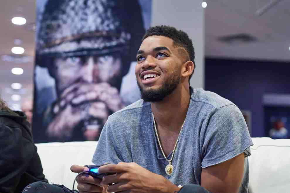 MINNEAPOLIS, MN - AUGUST 27: Karl-Anthony Towns and Ashley Glassel live stream "Call of Duty: WWII" beta on August 27, 2017 in Minneapolis, Minnesota.