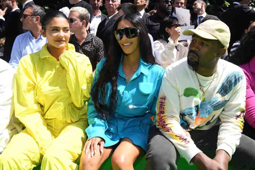 PARIS, FRANCE - JUNE 21: (L-R) Kylie Jenner, Kim Kardashian and Kanye West attend the Louis Vuitton Menswear Spring/Summer 2019 show as part of Paris Fashion Week on June 21, 2018 in Paris, France.