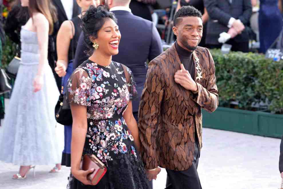 LOS ANGELES, CALIFORNIA - JANUARY 27: Taylor Simone Ledward and Chadwick Boseman attend the 25th annual Screen Actors Guild Awards at The Shrine Auditorium on January 27, 2019 in Los Angeles, California.