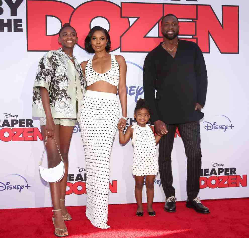 LOS ANGELES, CALIFORNIA - MARCH 16:(L-R) Zaya Wade, Gabrielle Union, Kaavia James Union Wade and Dwyane Wade attend the World Premiere of "Cheaper By the Dozen" at El Capitan Theatre in Hollywood, California on March 16, 2022.