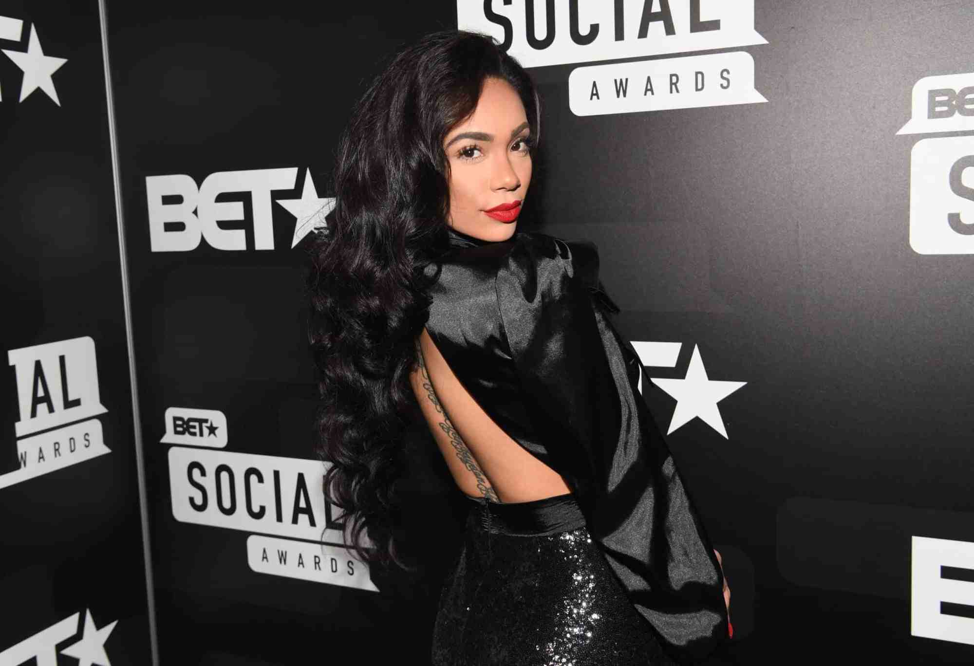 Erica Mena Shows Off Curves In Fishnets & A Bodysuit Amid Safaree Drama
