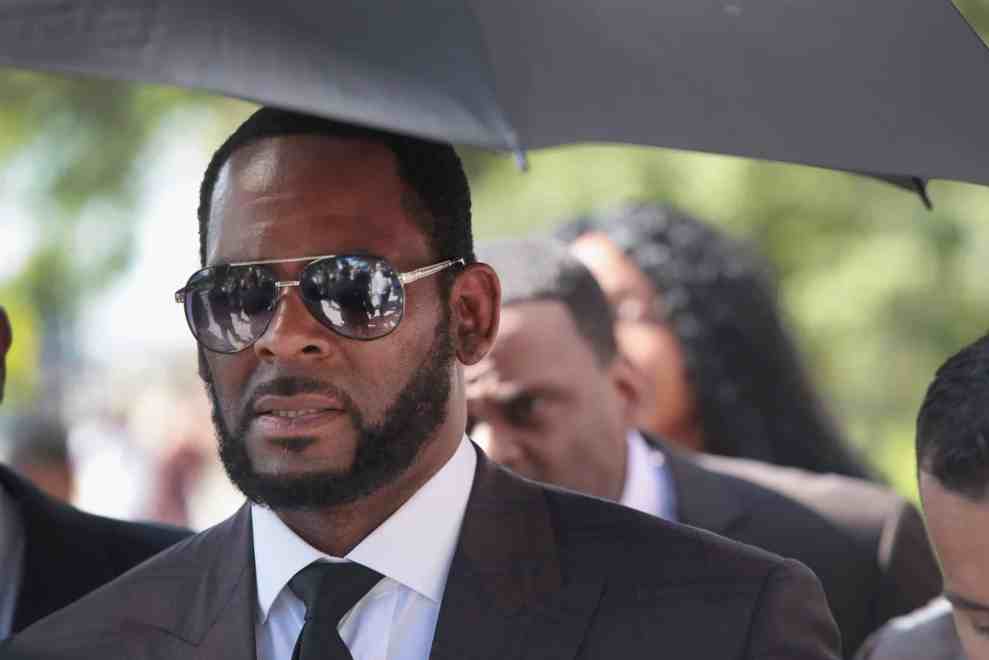 R&B singer R. Kelly leaves the Leighton Criminal Courts Building following a hearing on June 26, 2019 in Chicago, Illinois. Prosecutors turned over to Kelly's defense team a DVD that alleges to show Kelly having sex with an underage girl in the 1990s. Kelly has been charged with multiple sex crimes involving four women, three of whom were underage at the time of the alleged encounters.