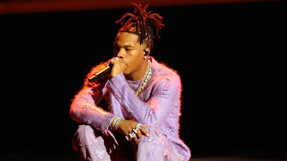 LOS ANGELES, CALIFORNIA - NOVEMBER 20: Lil Baby performs onstage during the 2022 American Music Awards at Microsoft Theater on November 20, 2022 in Los Angeles, California.