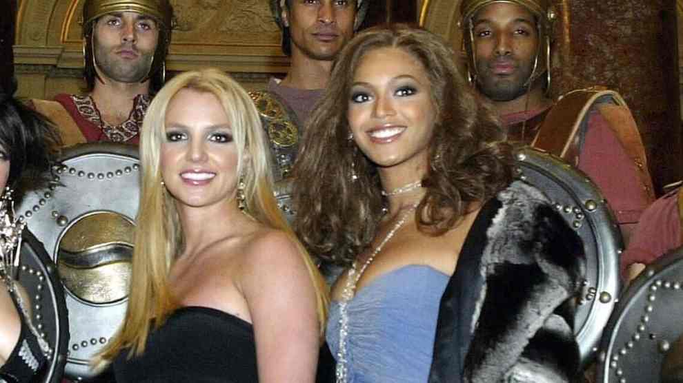 LONDON - JANUARY 26: Pink, Britney Spears, and Beyonce Knolwes pose with some Gladiators for the cameras during the Premiere for the new Pepsi Music Commercial "Pepsi Gladiators" at the National Gallery in Trafalgar Square on January 26, 2003 in London, England.