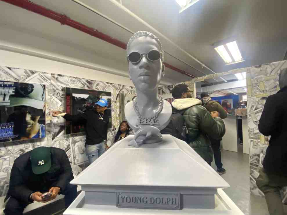 Photo of Young Dolph's bust on display at the Dolphland Pop-Up exhibit in NYC.