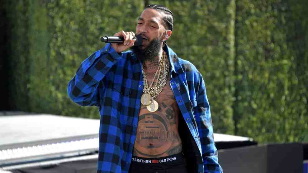 LOS ANGELES, CA - JUNE 24: Nipsey Hussle performs onstage at Live! Red! Ready! Pre-Show, sponsored by Nissan, at the 2018 BET Awards at Microsoft Theater on June 24, 2018 in Los Angeles, California.