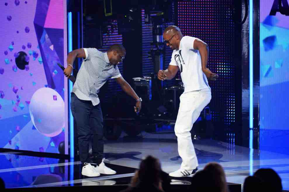 LOS ANGELES, CA - JUNE 30: Actor Kevin Hart presents an award to actor Jamie Foxx onstage during the 2013 BET Awards at Nokia Theatre L.A. Live on June 30, 2013 in Los Angeles, California.