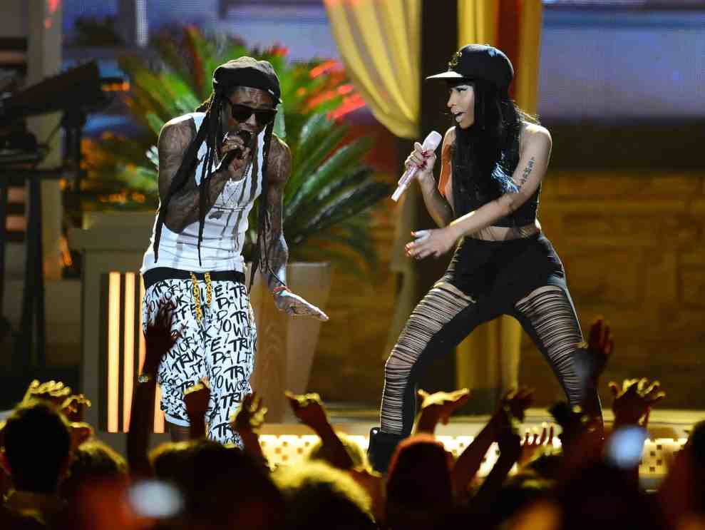 LAS VEGAS, NV - MAY 19: Rapper Lil Wayne (L) and recording artist Nicki Minaj perform onstage during the 2013 Billboard Music Awards at the MGM Grand Garden Arena on May 19, 2013 in Las Vegas, Nevada.
