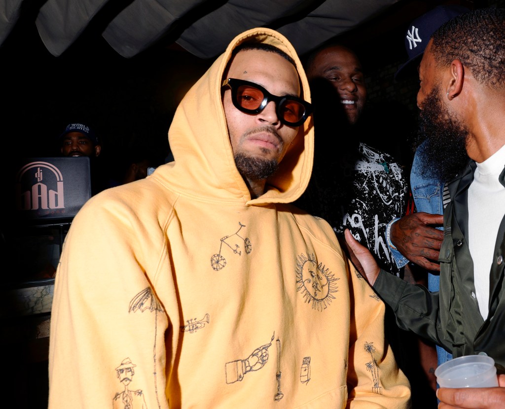 Chris Brown & Quavo Sit Next To Each Other At Paris Fashion Show; Brown Confirms Beef Still There