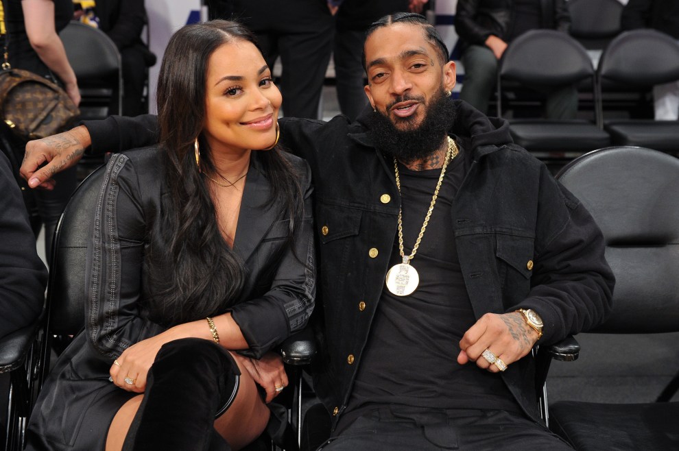 Nipsey Hussle and Lauren London attend a basketball game between the Los Angeles Lakers and the Portland Trail Blazers at Staples Center on November 14, 2018 in Los Angeles, California.