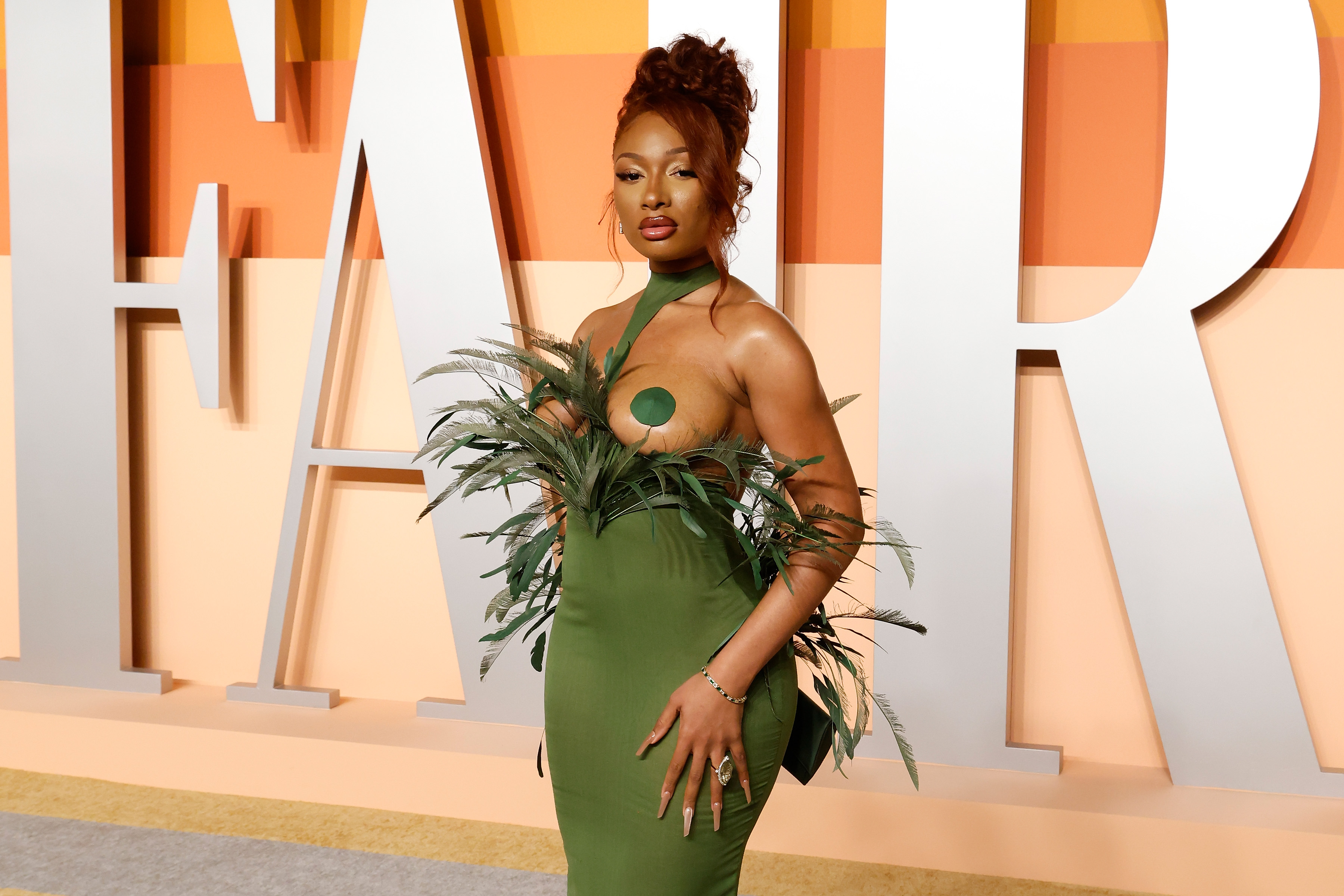 megan thee stallion green oscar dress Channels Poison Ivy At Vanity Fair Party Sets