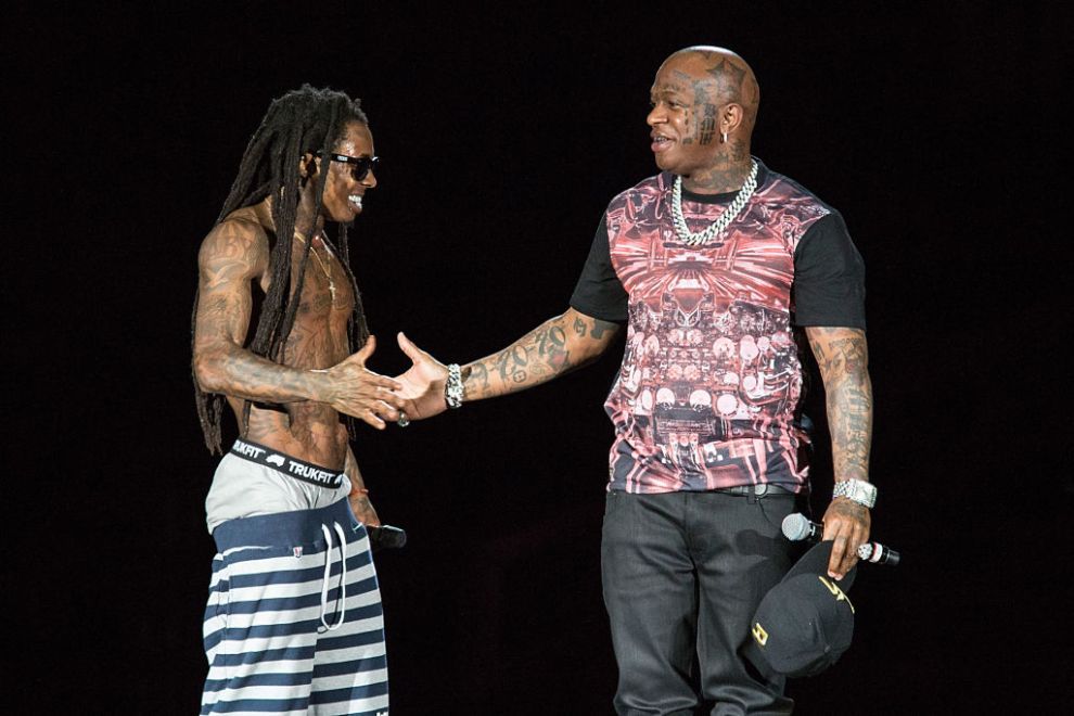 Rappers Lil Wayne (L) and Birdman perform in concert as part of America's Most Wanted Tour at Austin360 Amphitheater on August 17, 2013 in Austin, Texas.