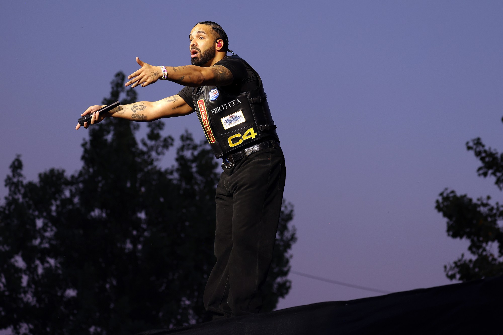 Drake Denies Viral Claim About T.I.’s Late Friend Cap