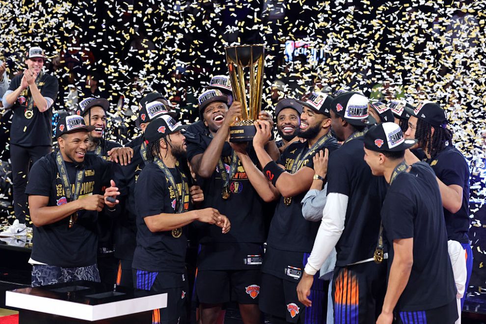 The New York Knicks celebrate with the trophy after defeating the San Antonio Spurs 124-113 to win the championship game of the Emirates NBA Cup at T-Mobile Arena on December 16, 2025 in Las Vegas, Nevada. NOTE TO USER: User expressly acknowledges and agrees that, by downloading and or using this photograph, User is consenting to the terms and conditions of the Getty Images License Agreement.
